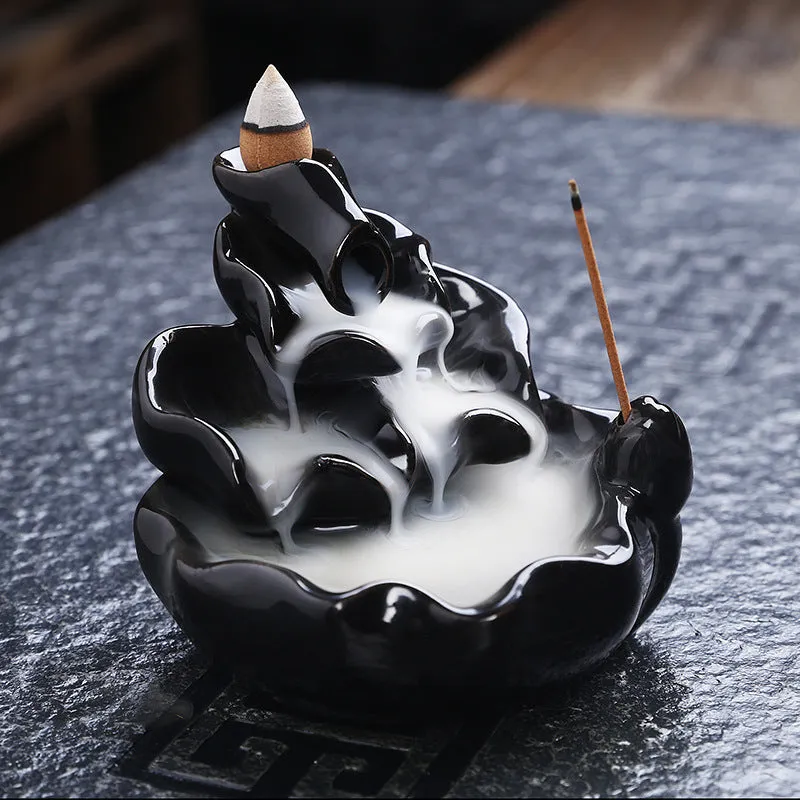 Ceramic backflow incense burner with black glaze finish and waterfall smoke effect