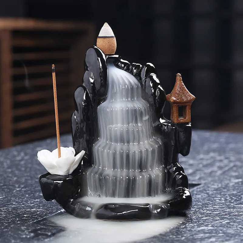 Ceramic backflow incense burner with black glaze finish and waterfall smoke effect