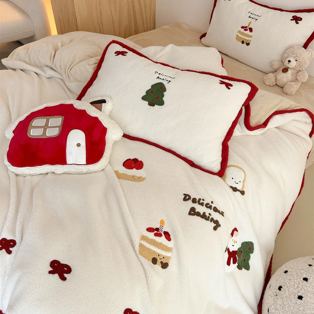 Winter Christmas cartoon cashmere bedding four-piece set shown on bed with duvet cover and pillowcases