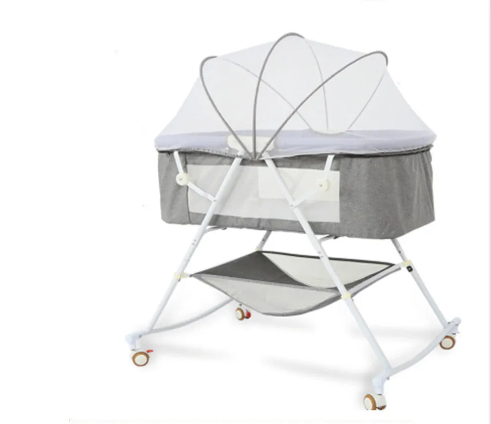 Foldable European style newborn crib with iron frame, shaker, roller, and mosquito net in a nursery setting