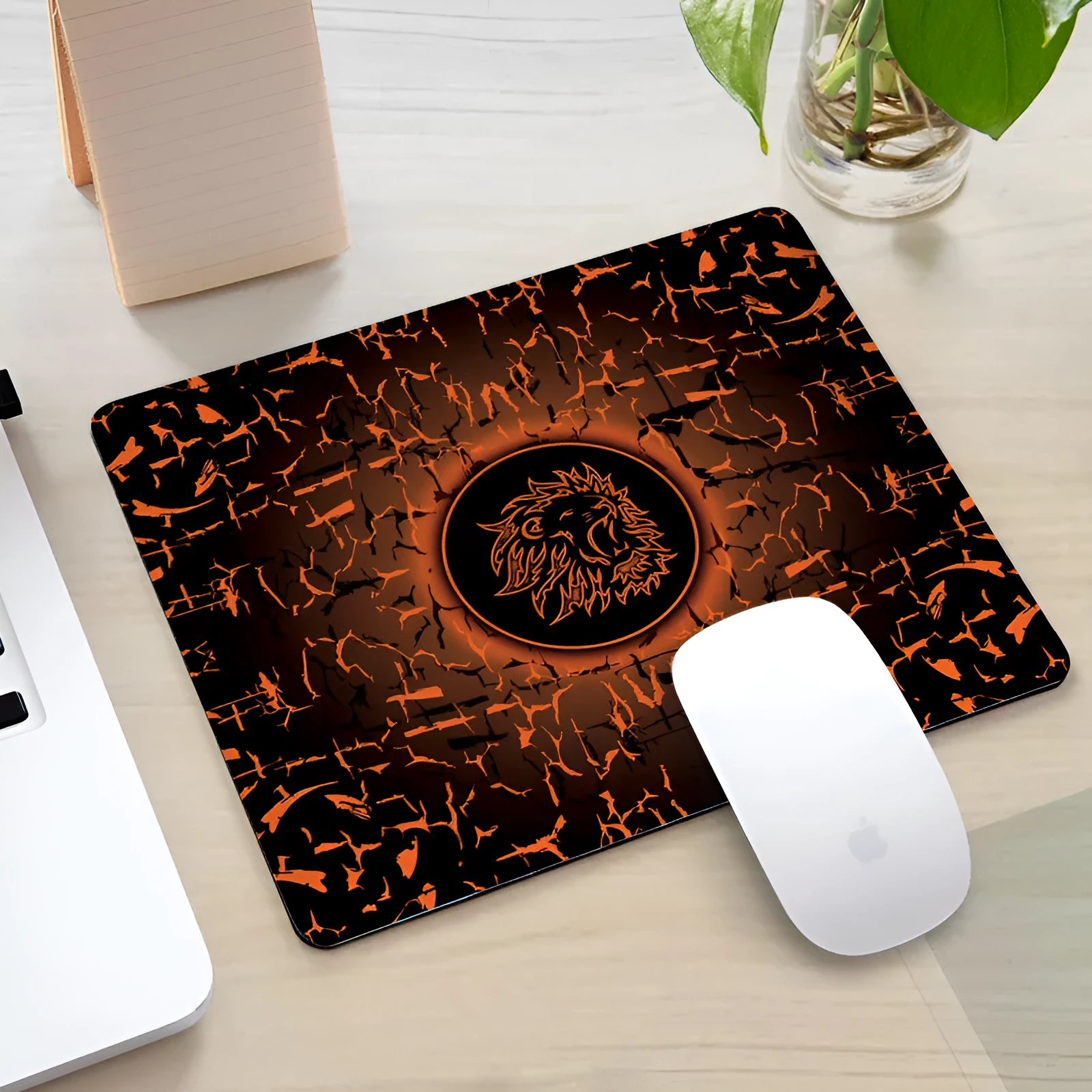 Office gaming mouse pad with rubber cloth construction and roar pattern in orange colour