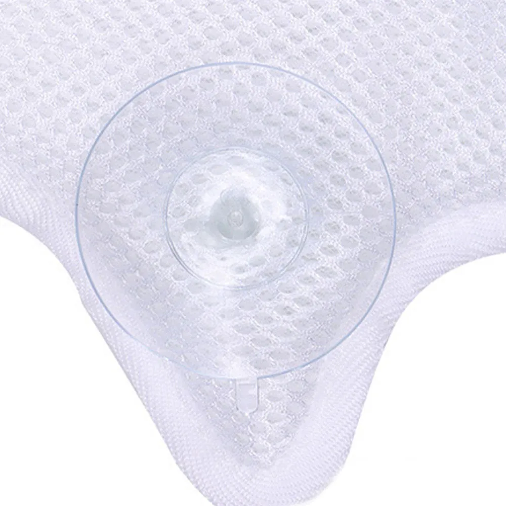 White ergonomic bathtub pillow with owl shape, 5D mesh fabric, and strong suction cups on a smooth bath surface