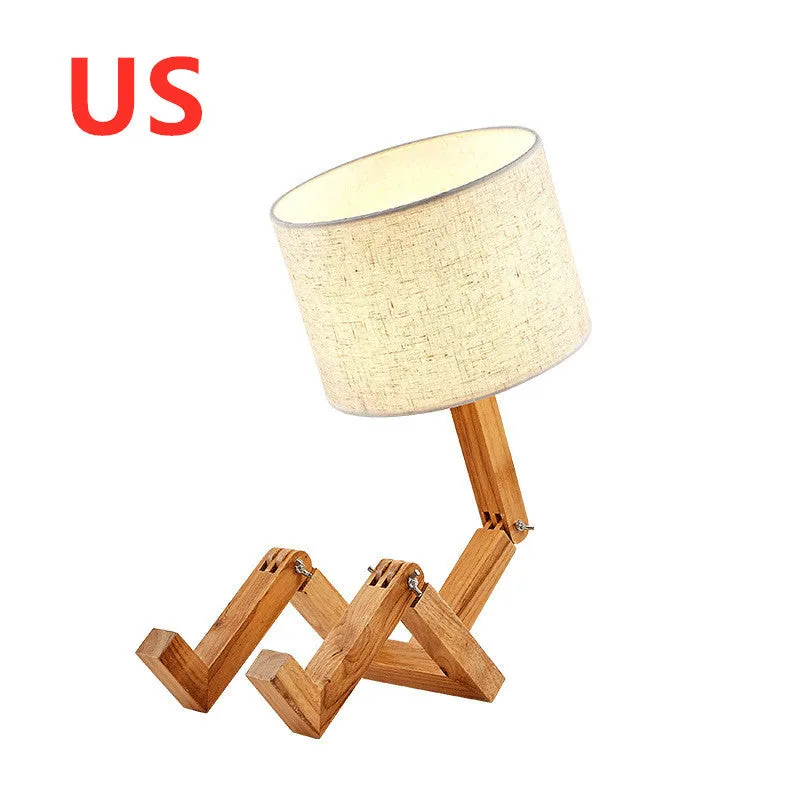 Creative small humanoid wooden table lamp with white fabric shade, 22x44x16cm, on bedside table