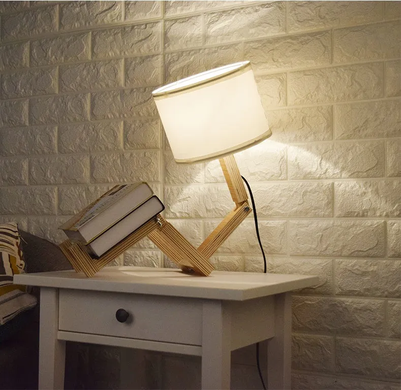 Creative small humanoid wooden table lamp with white fabric shade, 22x44x16cm, on bedside table