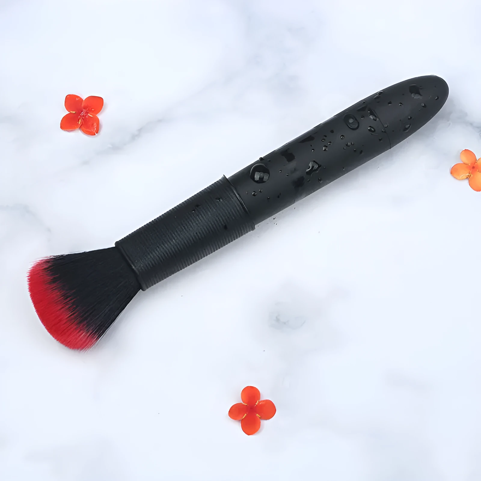 Women's beauty vibrator cosmetics brush massage toy in black with USB recharge port and one-button control