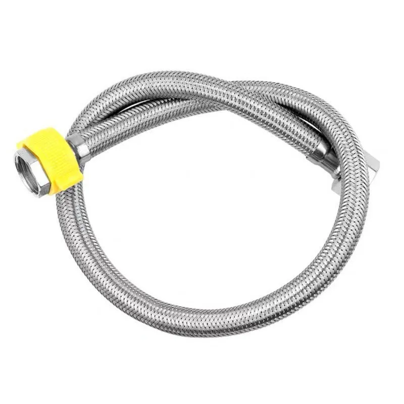 Black household bar cup washer 3-piece set with tee joint and braided hose on a kitchen counter