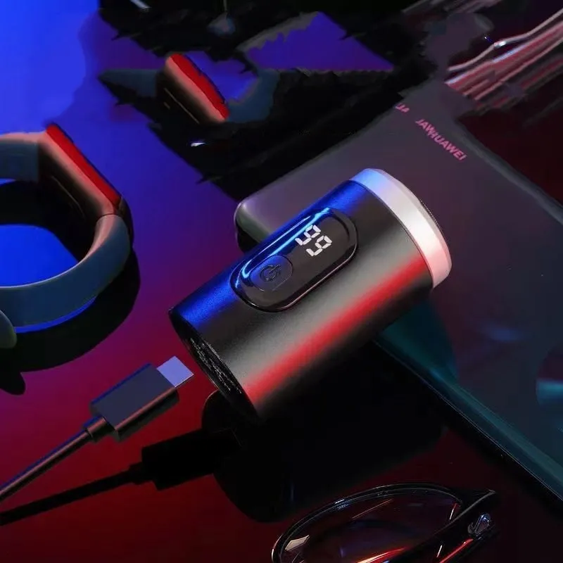 Black portable rechargeable shaver with USB charging cable and cleaning brush accessories