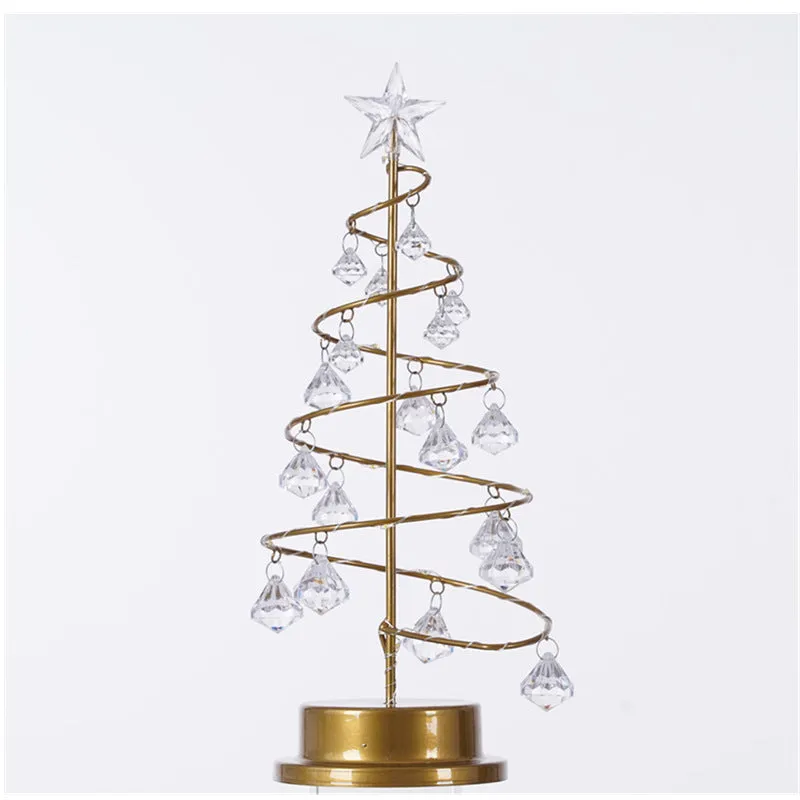 Gold crystal Christmas tree LED light with warm glow, star topper, 33cm tall, on a tabletop