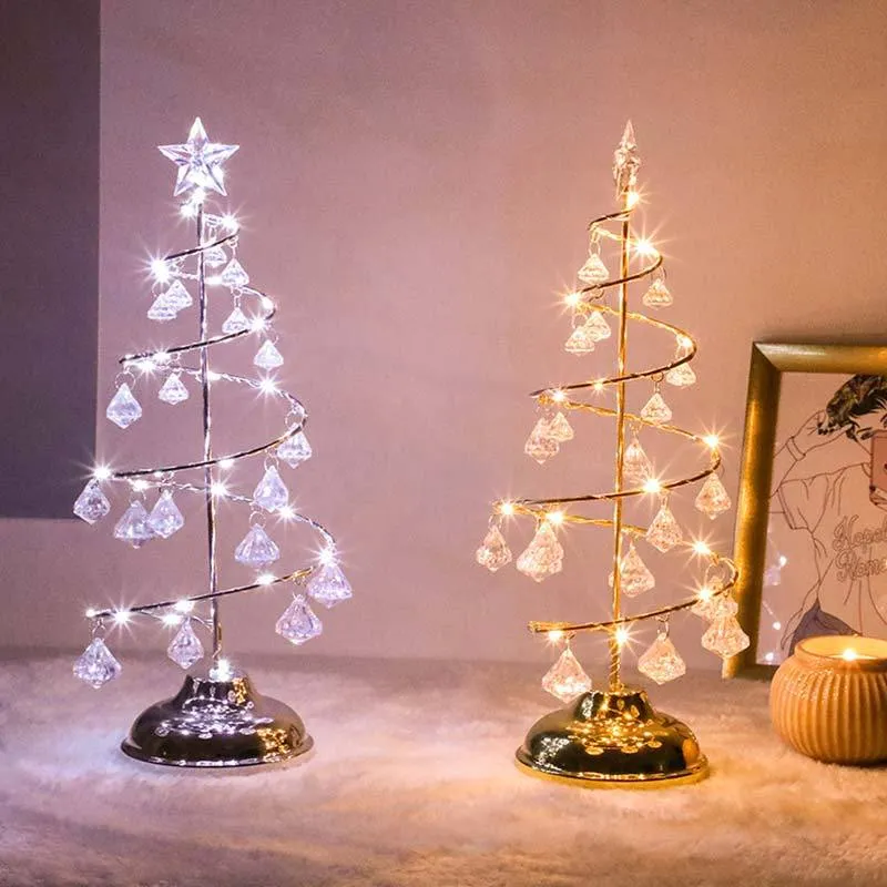 Gold crystal Christmas tree LED light with warm glow, star topper, 33cm tall, on a tabletop
