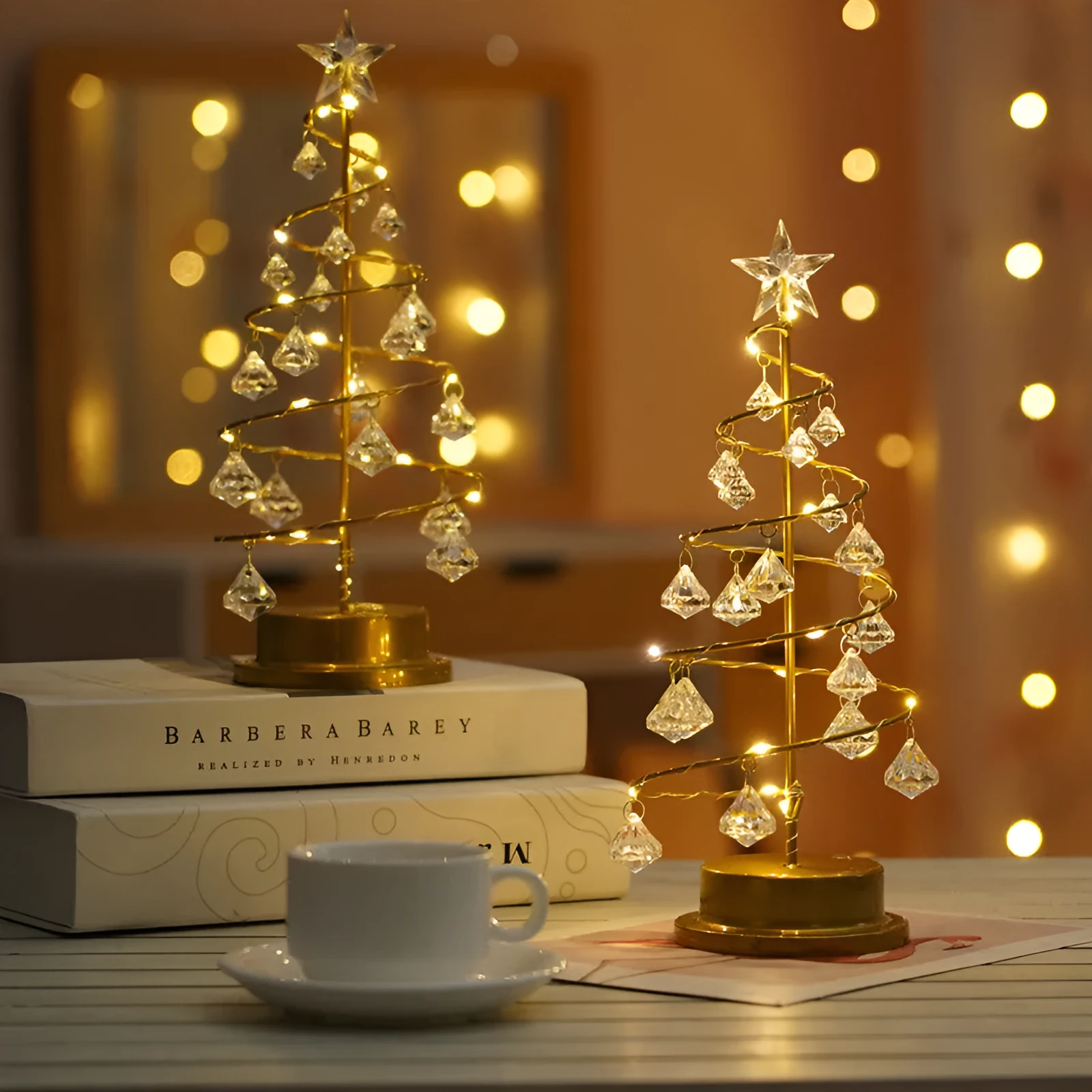 Gold crystal Christmas tree LED light with warm glow, star topper, 33cm tall, on a tabletop
