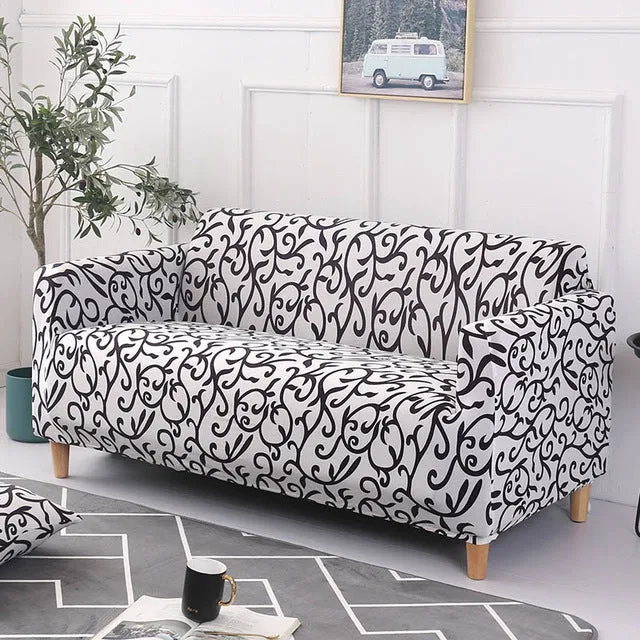 Elastic three-seat sofa cover in polyester blend fabric, stretched over a sofa, available in multiple colours A-J