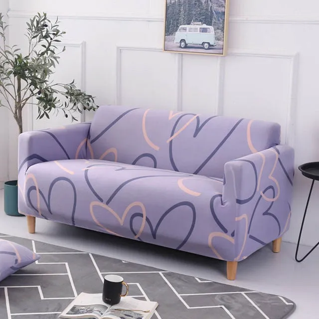 Elastic three-seat sofa cover in polyester blend fabric, stretched over a sofa, available in multiple colours A-J