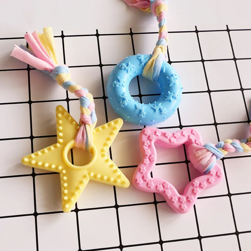 Non-toxic rubber dog chew toy in star shape with textured surface for teeth cleaning