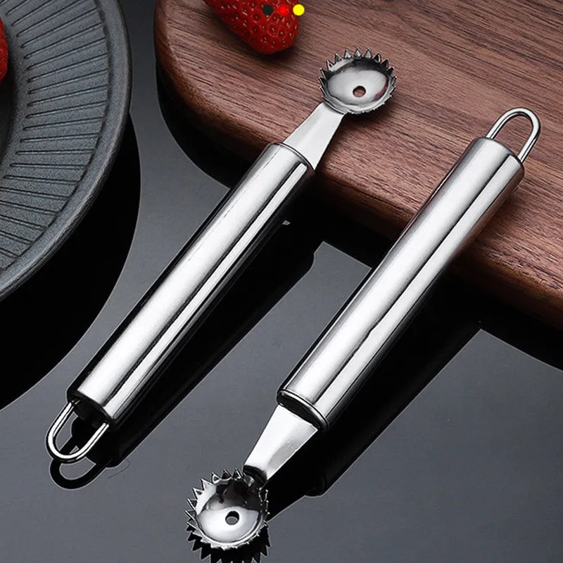 410 stainless steel strawberry stem remover on a light background, showing handheld design