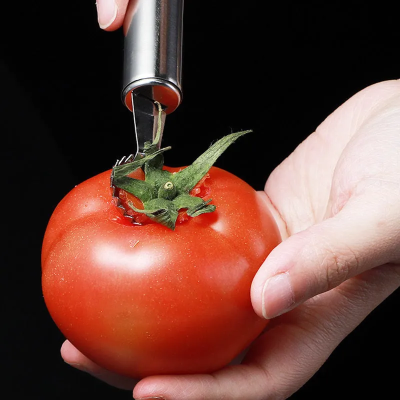 410 stainless steel strawberry stem remover on a light background, showing handheld design