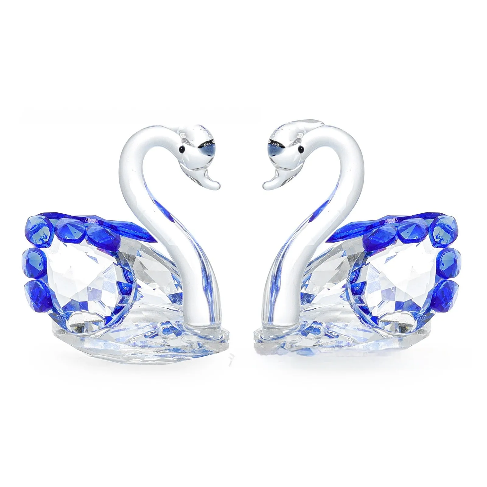 White crystal swan ornament in modern simplicity style on a desktop