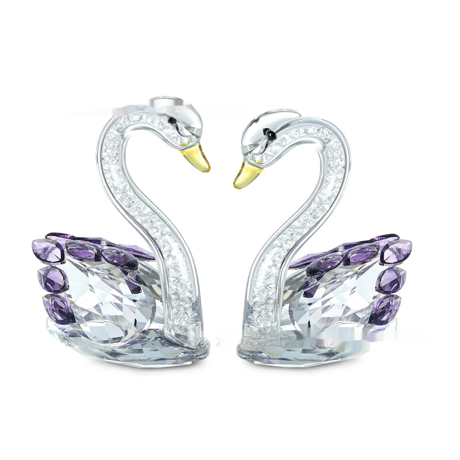 White crystal swan ornament in modern simplicity style on a desktop