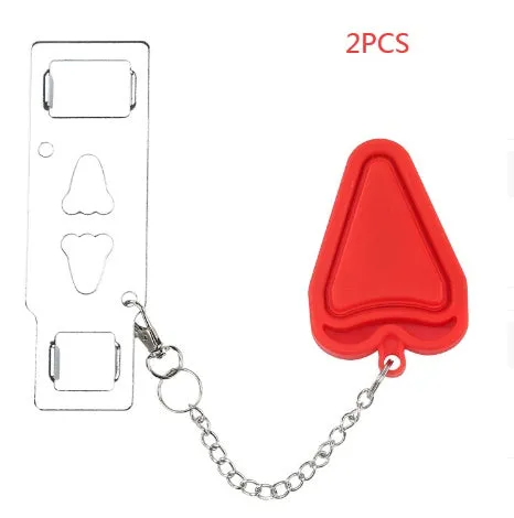 Red portable door safety latch lock with chrome-plated metal piece installed on a wooden door jamb