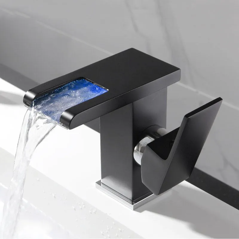 Waterfall basin faucet with chrome finish and induction sensor for hands-free bathroom use