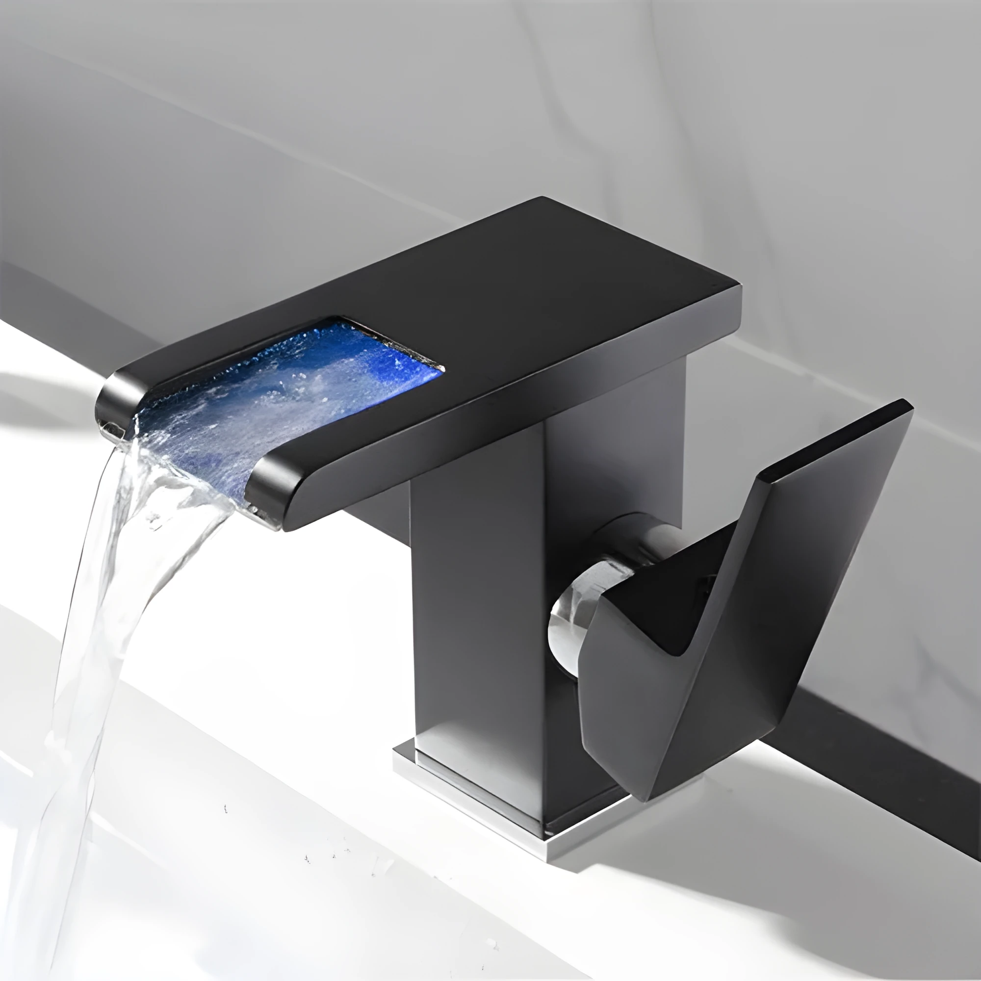 Waterfall basin faucet with chrome finish and induction sensor for hands-free bathroom use