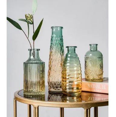 Colourful electroplated glass vase with thicker bottom, transparent finish, and bright gloss. Available in multiple sizes for home or hydroponic use.