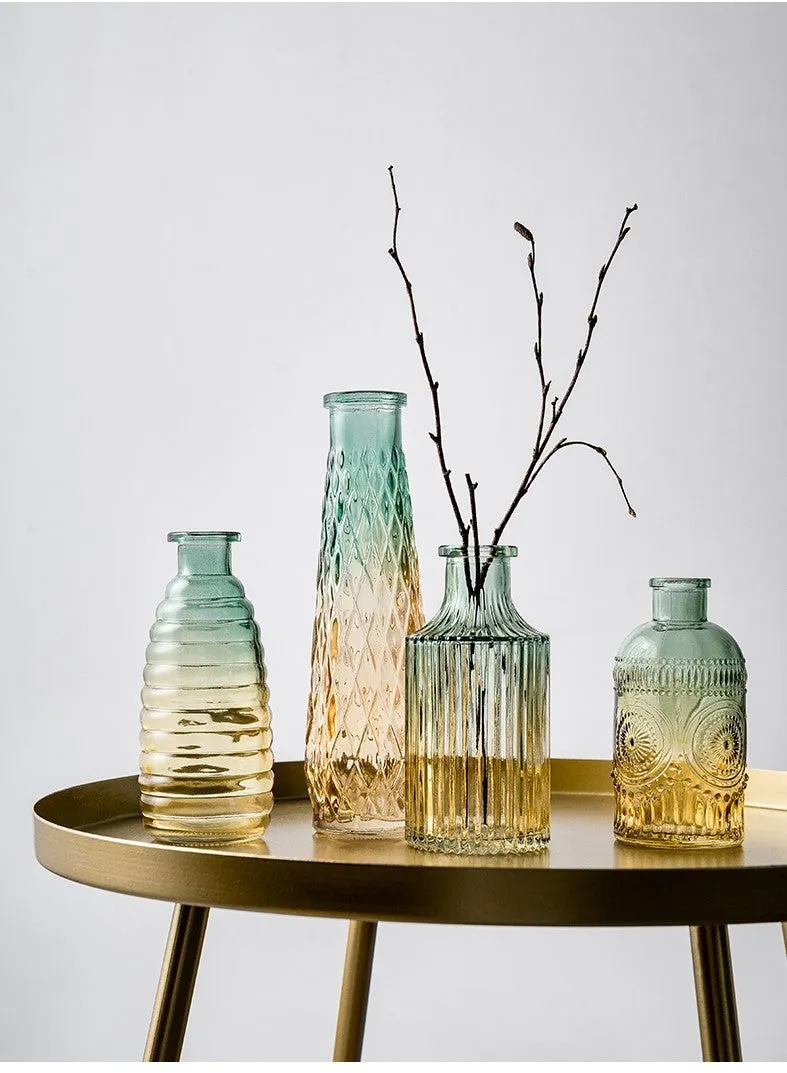 Colourful electroplated glass vase with thicker bottom, transparent finish, and bright gloss. Available in multiple sizes for home or hydroponic use.