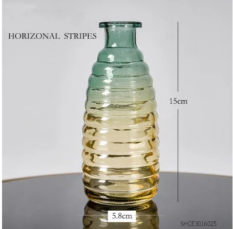 Colourful electroplated glass vase with thicker bottom, transparent finish, and bright gloss. Available in multiple sizes for home or hydroponic use.