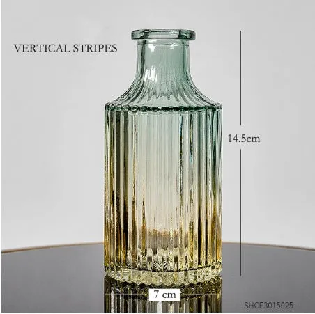 Colourful electroplated glass vase with thicker bottom, transparent finish, and bright gloss. Available in multiple sizes for home or hydroponic use.