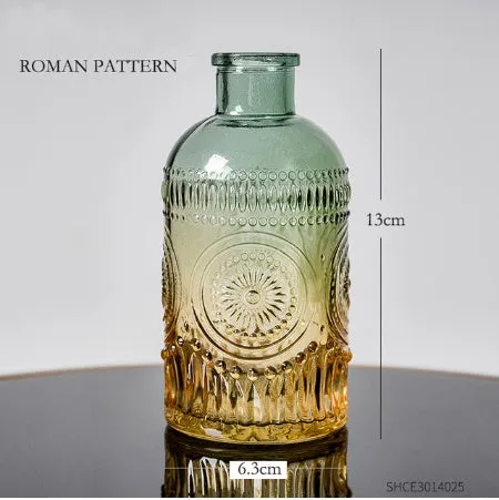 Colourful electroplated glass vase with thicker bottom, transparent finish, and bright gloss. Available in multiple sizes for home or hydroponic use.