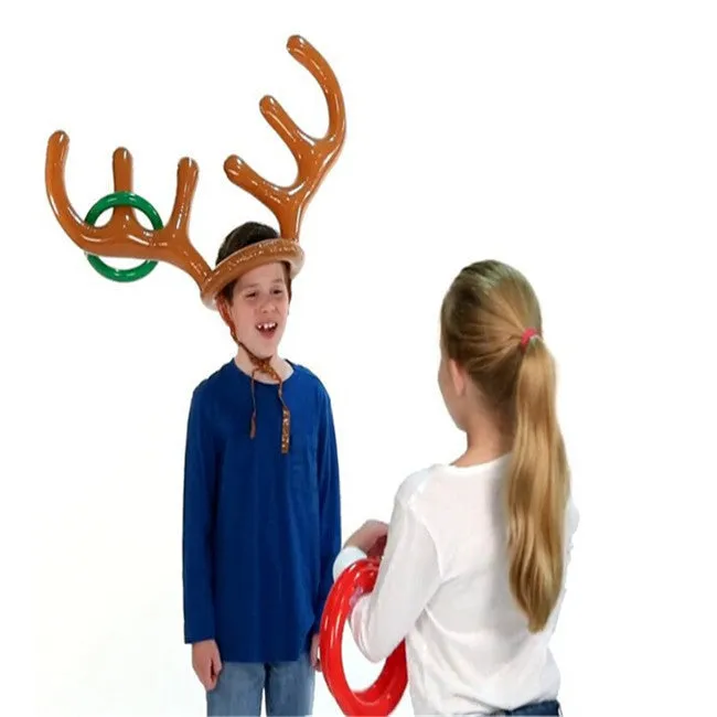 Inflatable reindeer antler hat ring toss game set with green and red rings on a blue background