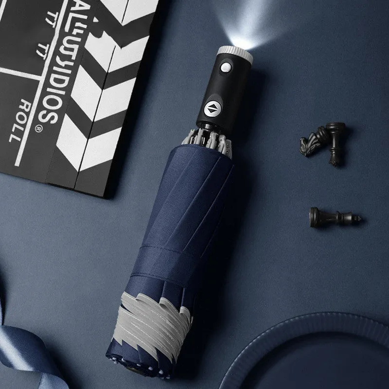Automatic reverse umbrella with 10-bone frame in black, showing folded and open positions against a white background