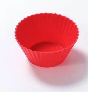12 nonstick reusable silicone cupcake liners in six colours arranged for baking