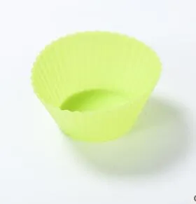 12 nonstick reusable silicone cupcake liners in six colours arranged for baking