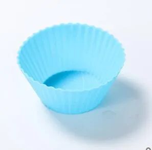 12 nonstick reusable silicone cupcake liners in six colours arranged for baking