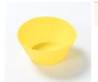 12 nonstick reusable silicone cupcake liners in six colours arranged for baking