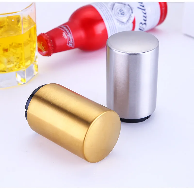 Silver magnetic automatic bottle opener with stainless steel body and brushed finish on kitchen countertop