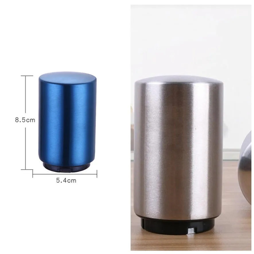 Silver magnetic automatic bottle opener with stainless steel body and brushed finish on kitchen countertop