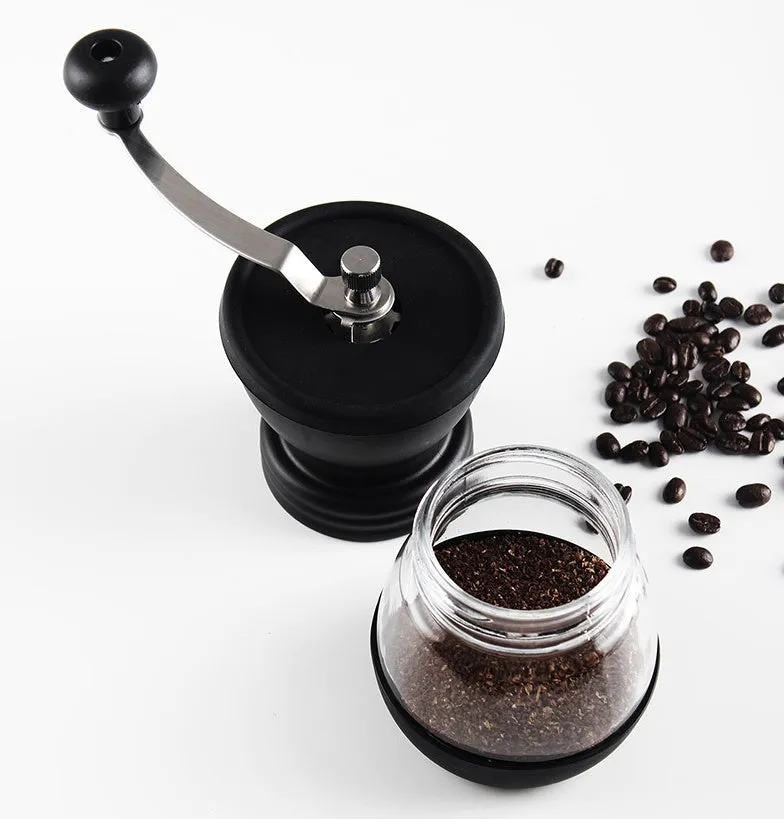 Beech wood hand grinder coffee machine with black finish, 88 mm wide, on a table