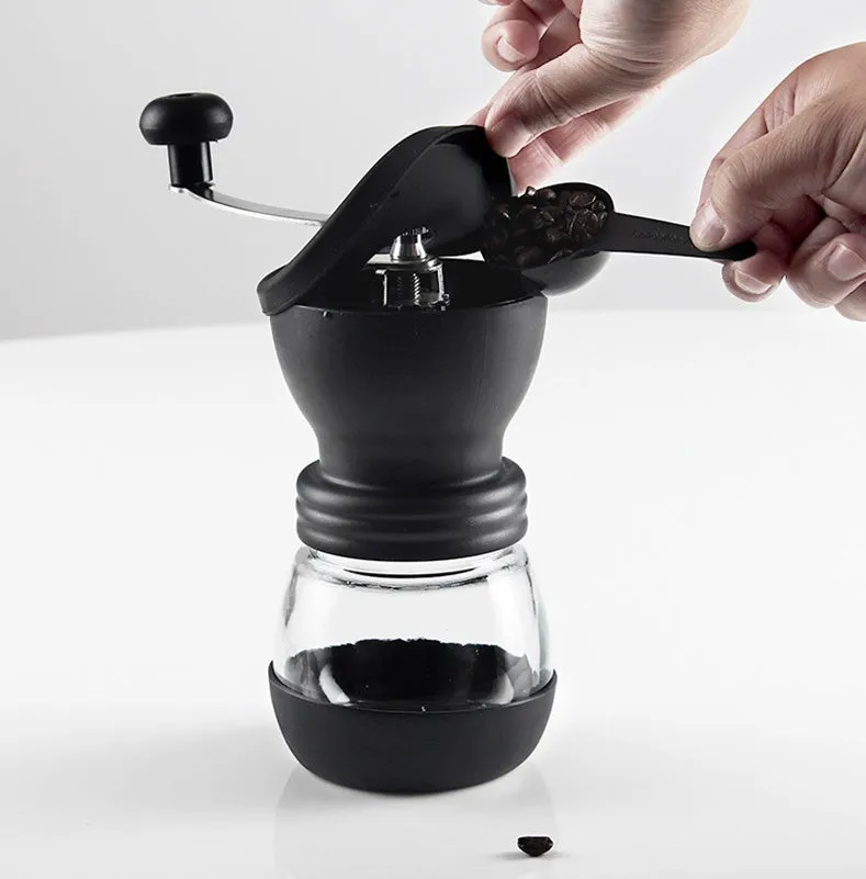 Beech wood hand grinder coffee machine with black finish, 88 mm wide, on a table