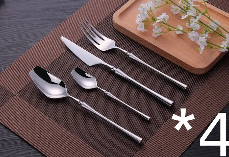 Stainless steel cutlery set with main knife, main fork, main spoon, and teaspoon in silver finish