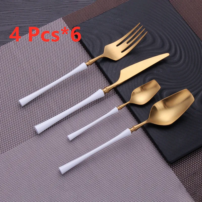 Stainless steel cutlery set with main knife, main fork, main spoon, and teaspoon in silver finish
