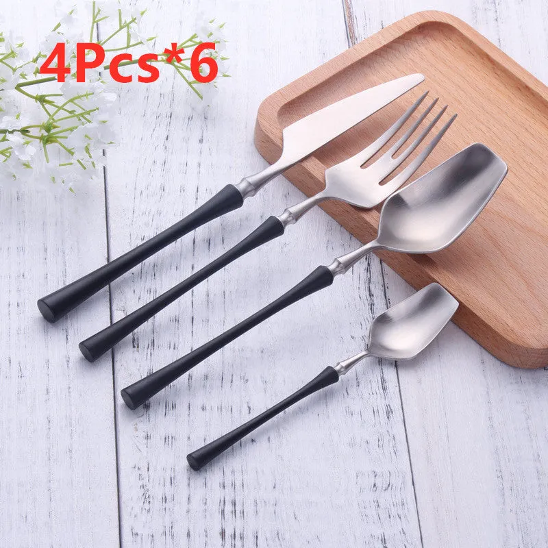 Stainless steel cutlery set with main knife, main fork, main spoon, and teaspoon in silver finish