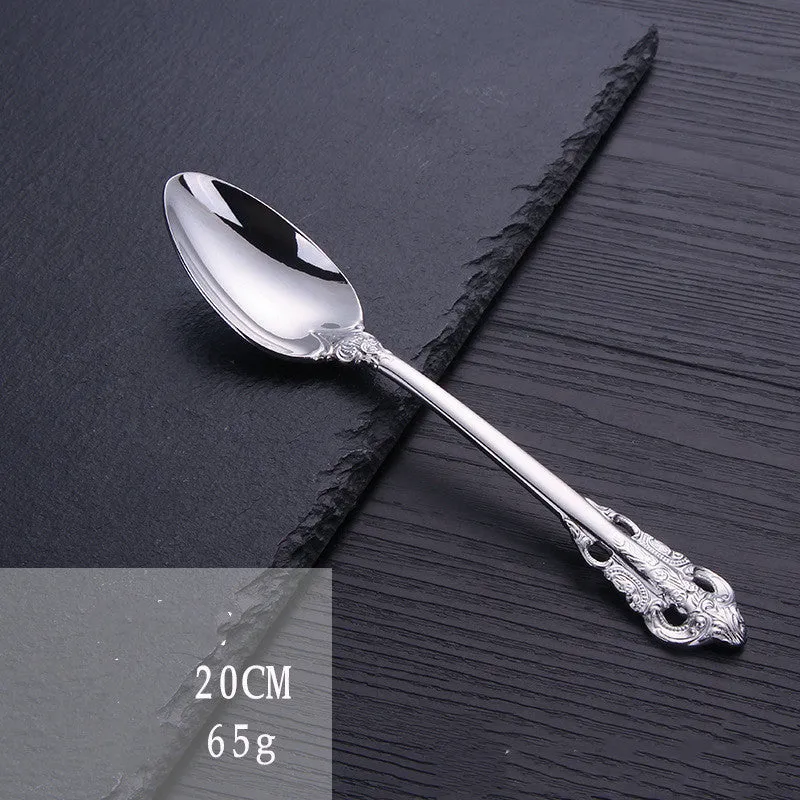 Stainless steel cutlery set with main knife, main fork, main spoon, and teaspoon in silver finish