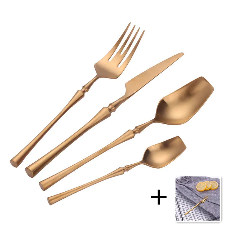 Stainless steel cutlery set with main knife, main fork, main spoon, and teaspoon in silver finish