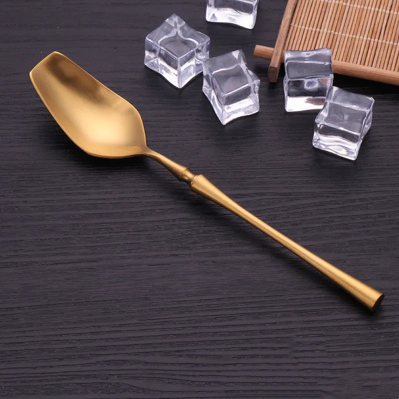 Stainless steel cutlery set with main knife, main fork, main spoon, and teaspoon in silver finish