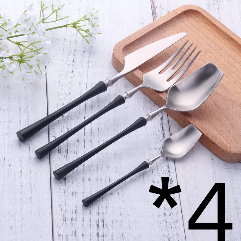 Stainless steel cutlery set with main knife, main fork, main spoon, and teaspoon in silver finish