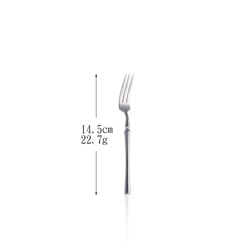 Stainless steel cutlery set with main knife, main fork, main spoon, and teaspoon in silver finish