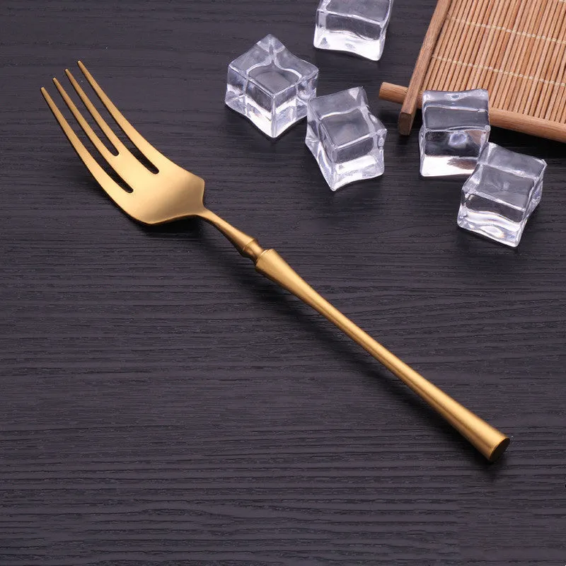 Stainless steel cutlery set with main knife, main fork, main spoon, and teaspoon in silver finish
