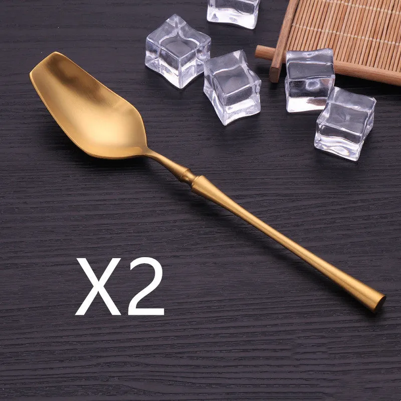 Stainless steel cutlery set with main knife, main fork, main spoon, and teaspoon in silver finish