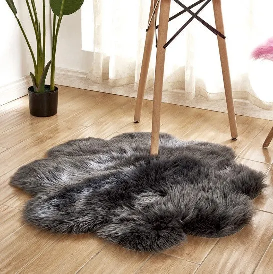 Artificial woolen floral sheepskin hairy plush carpet rug in beige colour, 60x60 cm size, on a tiled floor